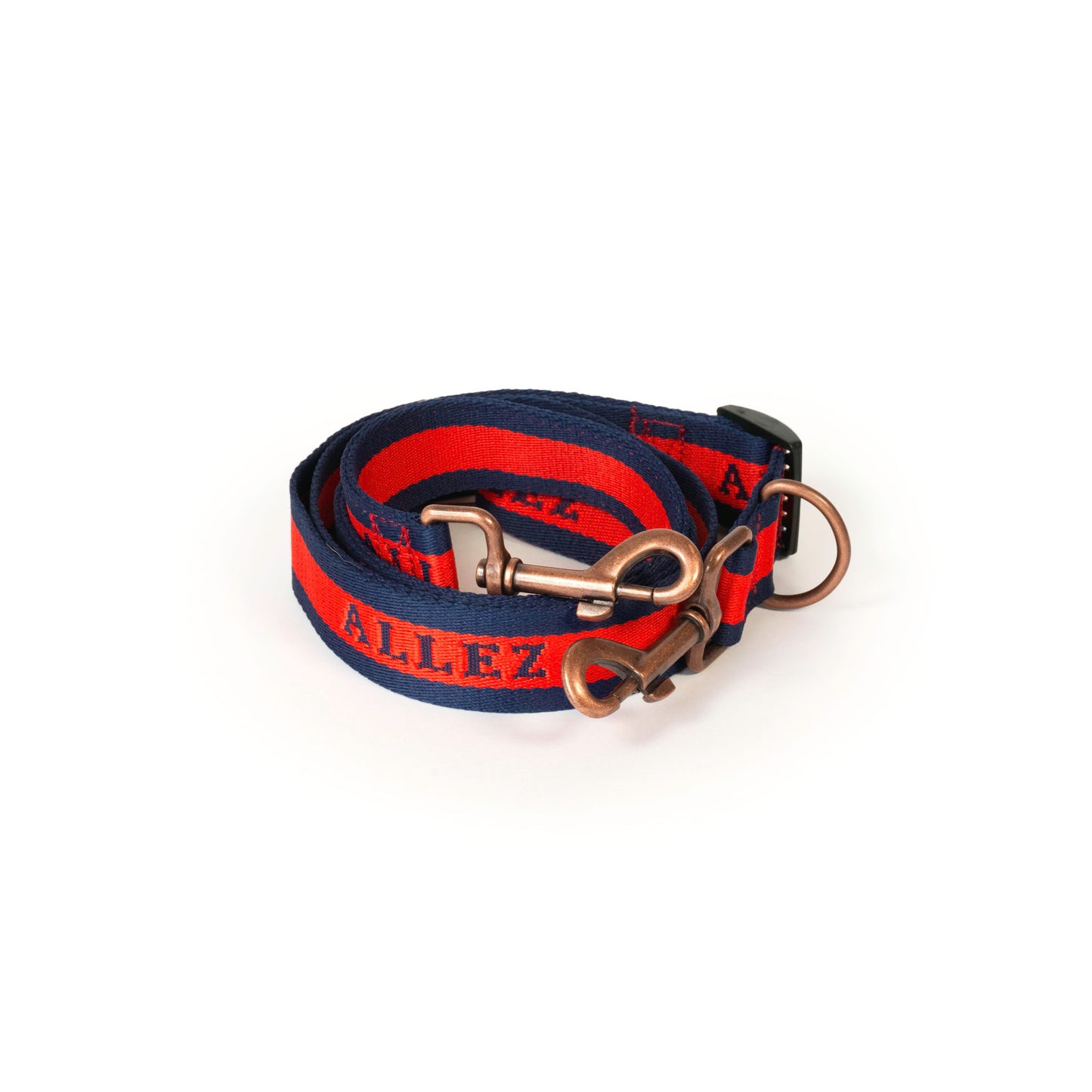 Navy and blue dog leash with Allez branding in luxury fabric with brass clips, with double D rings and a length adjuster on a white background